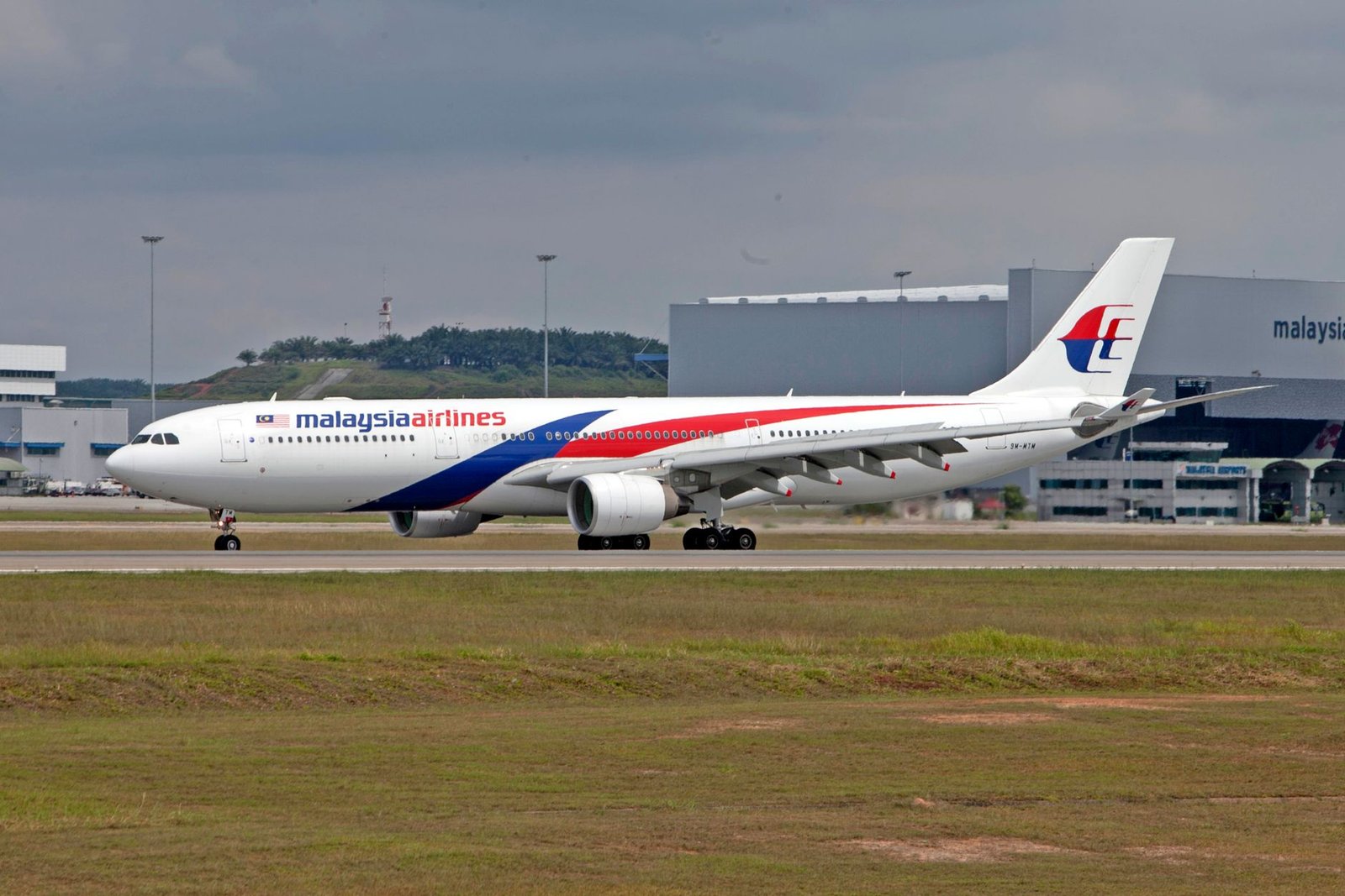 Fukuoka Without the Tokyo Crush: Why Kyushu Is the Smarter Japan Trip This Spring 4 view of a malaysia airlines airliner at the airport