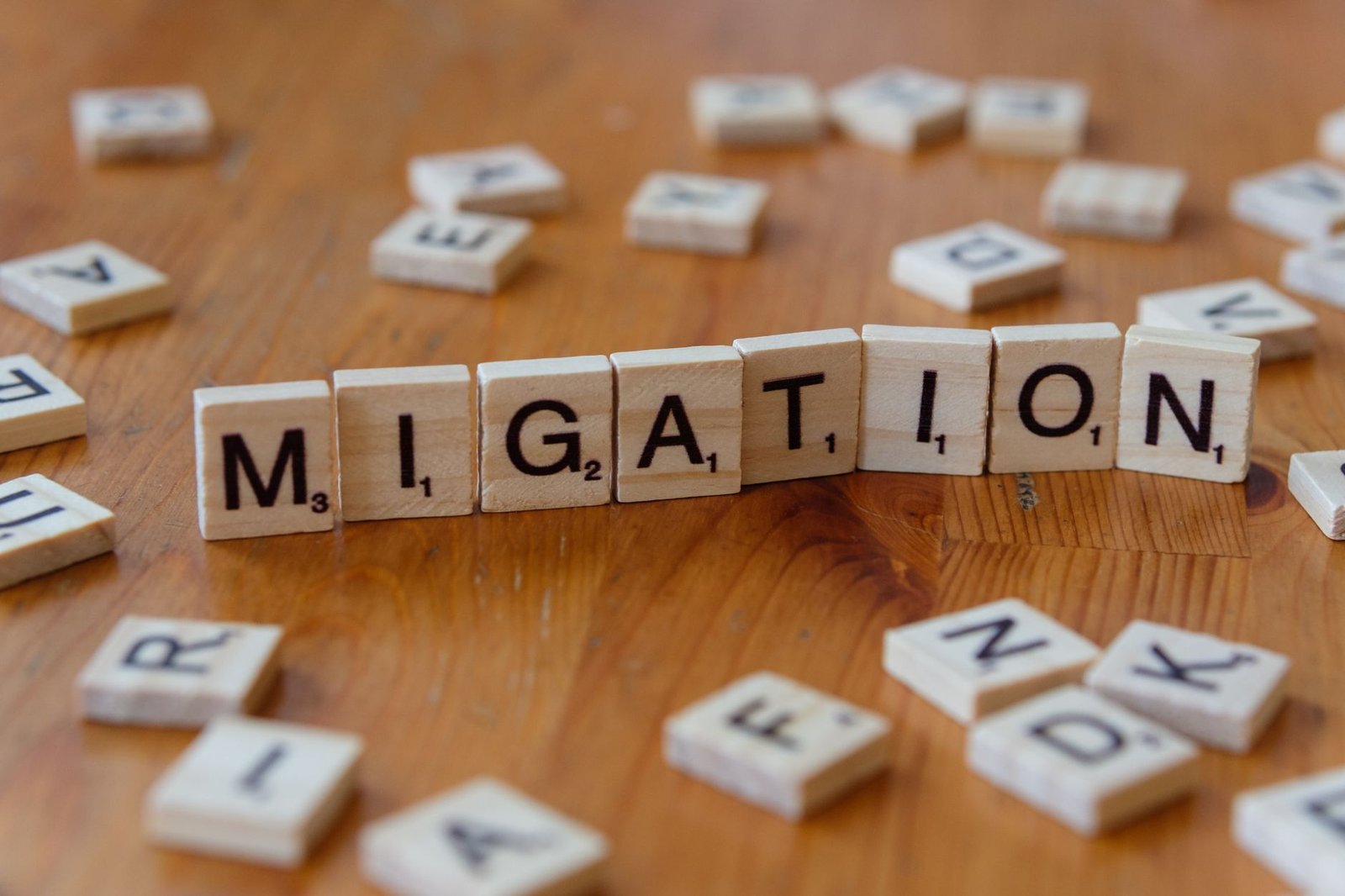 Thailand Visa-Free Stay Cut to 30 Days: What Travellers Need to Know 1 scrabble tiles spelling migration on wooden table
