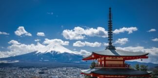 Japan Ranked World’s Best Travel Country in 2026: How to See It Without the Crowds chureito pagoda with mount fuji in spring