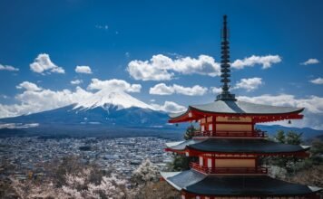 Japan Ranked World’s Best Travel Country in 2026: How to See It Without the Crowds chureito pagoda with mount fuji in spring