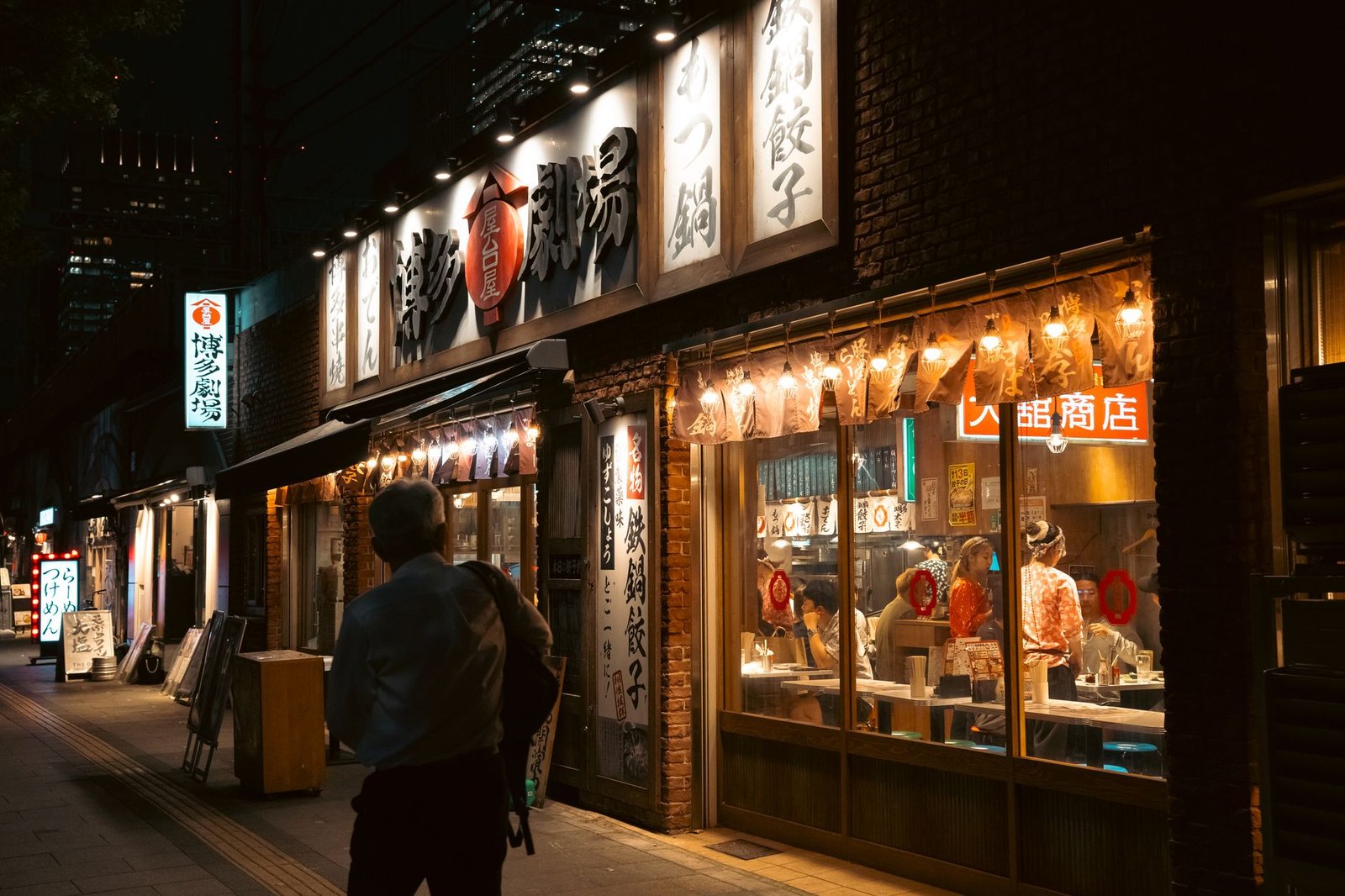 Fukuoka Without the Tokyo Crush: Why Kyushu Is the Smarter Japan Trip This Spring 3 tokyo night street view with traditional restaurant