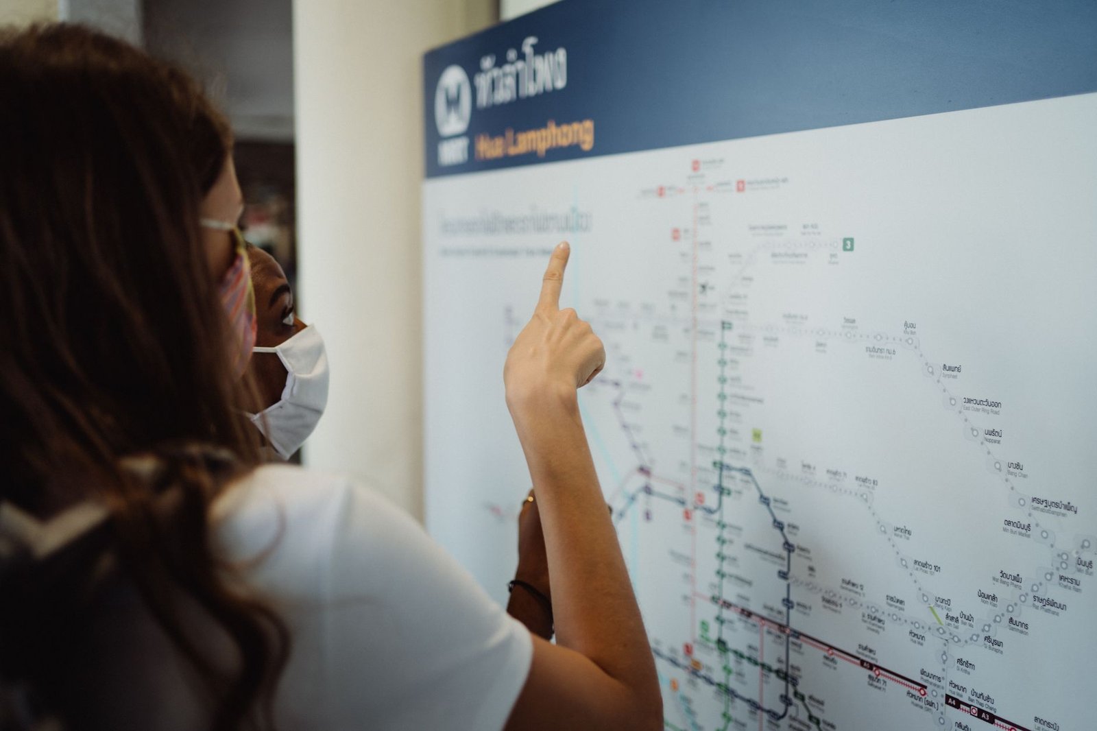 Thailand Visa-Free Stay Cut to 30 Days: What Travellers Need to Know 2 two people looking at a map